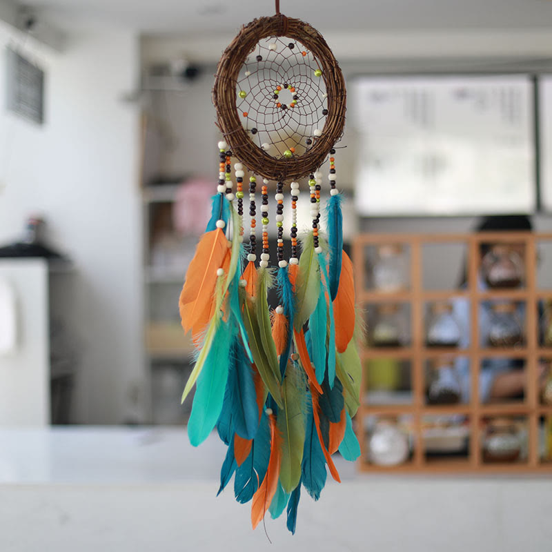 Attrape-rêves Olivenorma en rotin, plumes et perles mélangées, style bohème, symbole de la nature - image 2