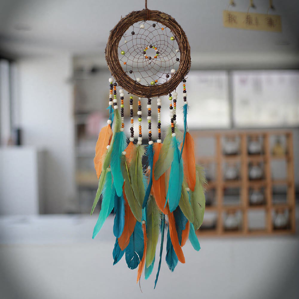 Attrape-rêves Olivenorma en rotin, plumes et perles mélangées, style bohème, symbole de la nature - image 1