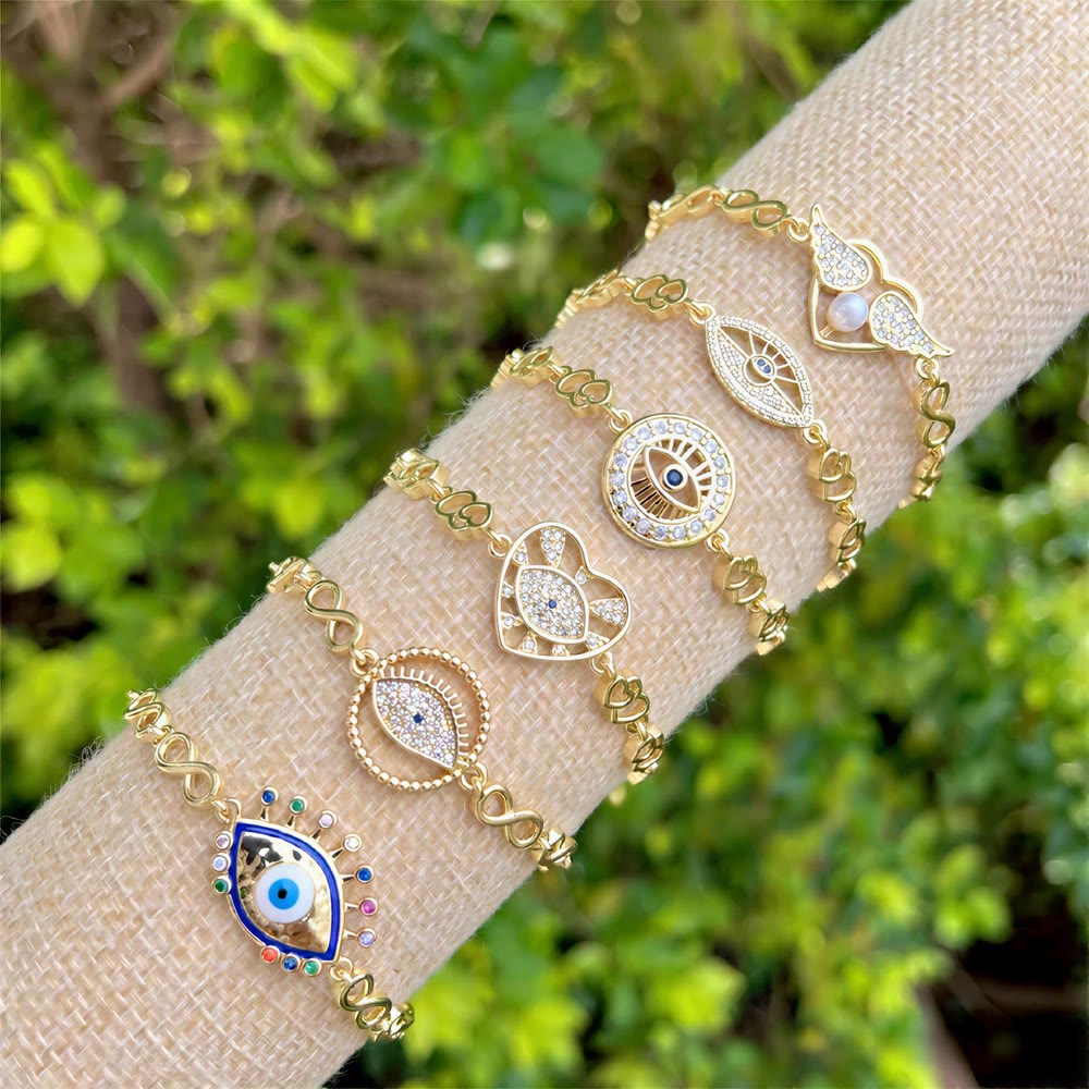 Bracelet Olivenorma en cuivre avec pendentif œil protecteur et porte-bonheur - image 0