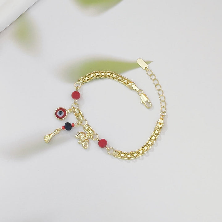 Bracelet Olivenorma en cuivre avec breloque œil protecteur et éléphant, symbole de protection et de bénédiction, orné d'un œil protecteur. - image 5