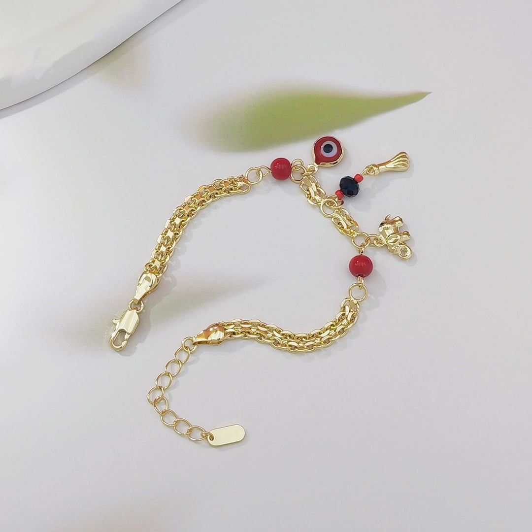 Bracelet Olivenorma en cuivre avec breloque œil protecteur et éléphant, symbole de protection et de bénédiction, orné d'un œil protecteur. - image 4