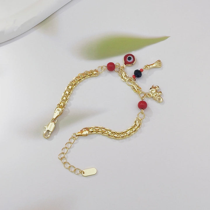 Bracelet Olivenorma en cuivre avec breloque œil protecteur et éléphant, symbole de protection et de bénédiction, orné d'un œil protecteur. - image 7