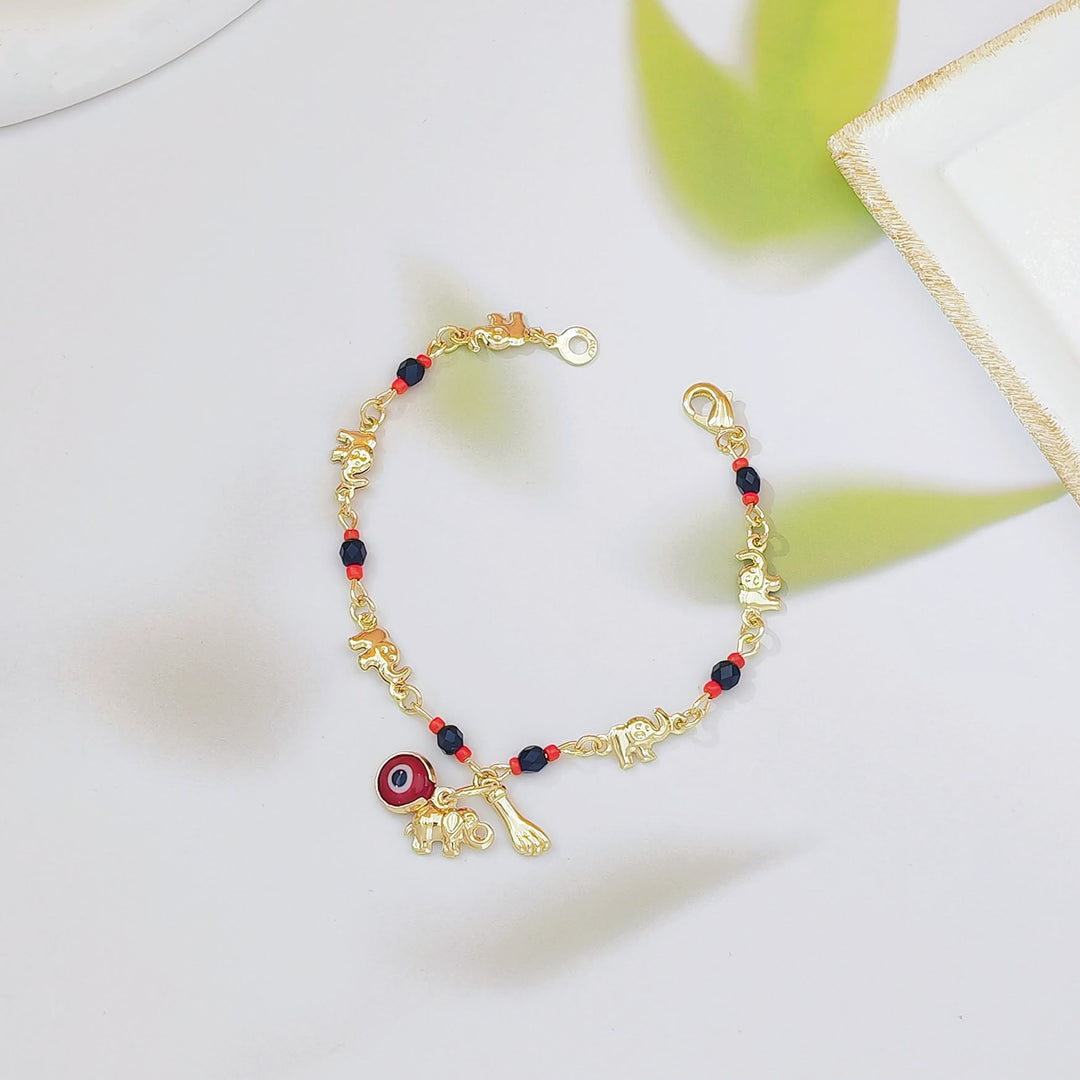 Bracelet Olivenorma en cuivre avec pendentif œil protecteur et perles, symbole de protection. - image 5