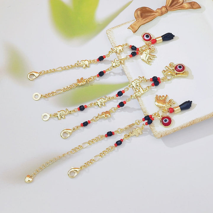Bracelet Olivenorma en cuivre avec pendentif œil protecteur et perles, symbole de protection. - image 8