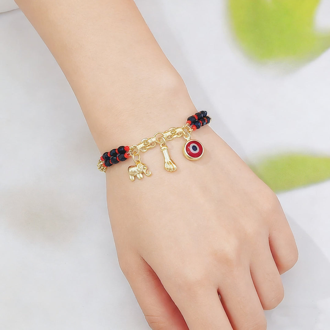 Bracelet Olivenorma en cuivre à perles mixtes et breloques multiples, orné d'un symbole de bénédiction - image 4