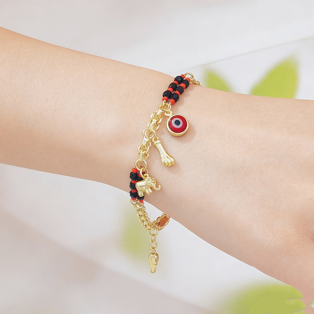 Bracelet Olivenorma en cuivre à perles mixtes et breloques multiples, orné d'un symbole de bénédiction - image 5
