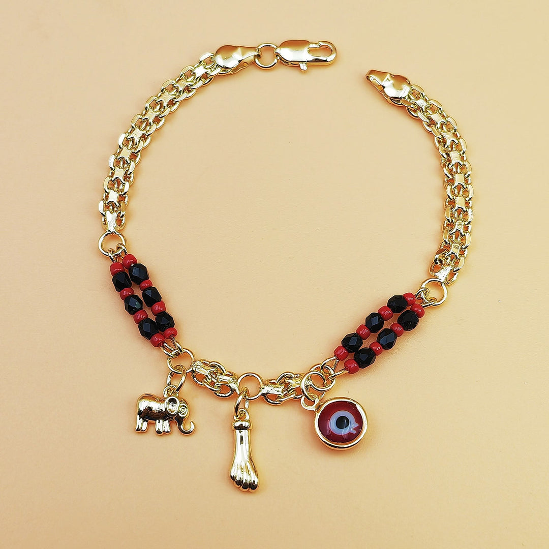 Bracelet Olivenorma en cuivre à perles mixtes et breloques multiples, orné d'un symbole de bénédiction - Breloque pour la main Éléphant au mauvais œil et Figa en or - image 0