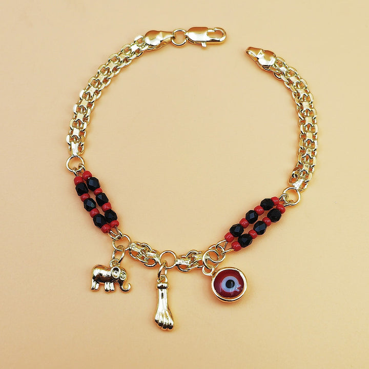 Bracelet Olivenorma en cuivre à perles mixtes et breloques multiples, orné d'un symbole de bénédiction - Breloque pour la main Éléphant au mauvais œil et Figa en or - image 0