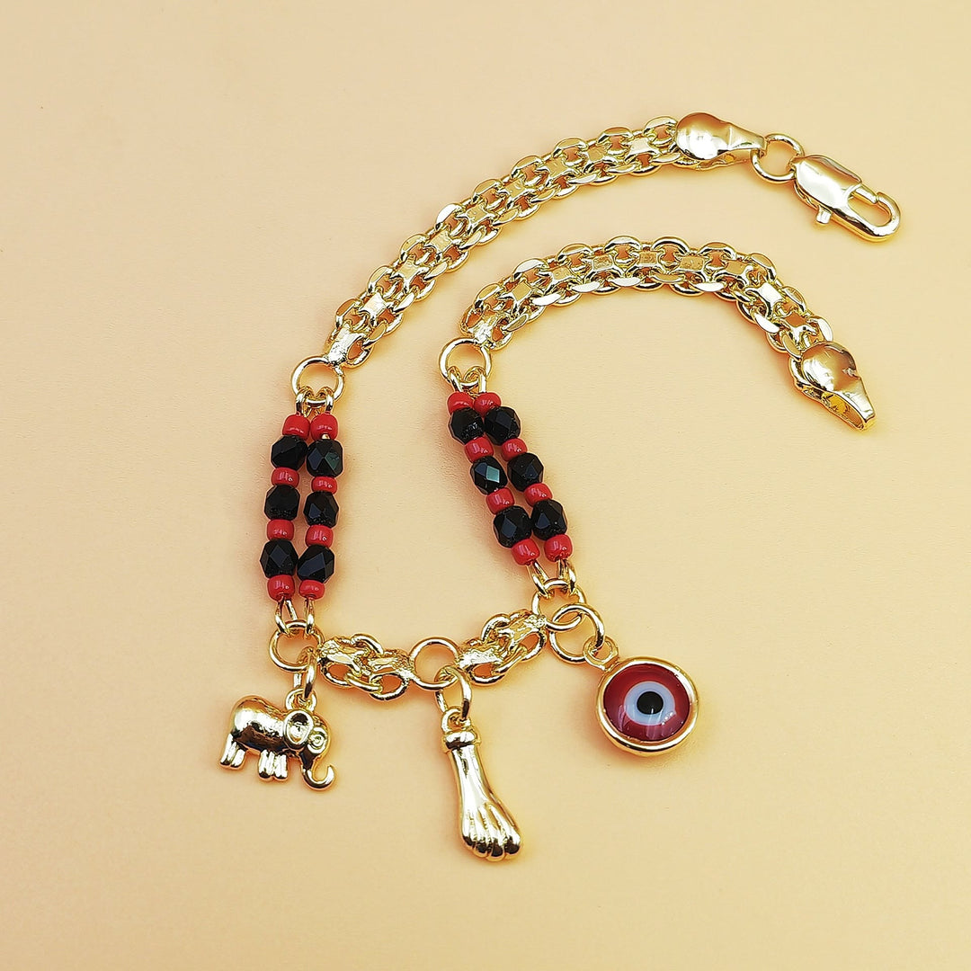 Bracelet Olivenorma en cuivre à perles mixtes et breloques multiples, orné d'un symbole de bénédiction - image 2