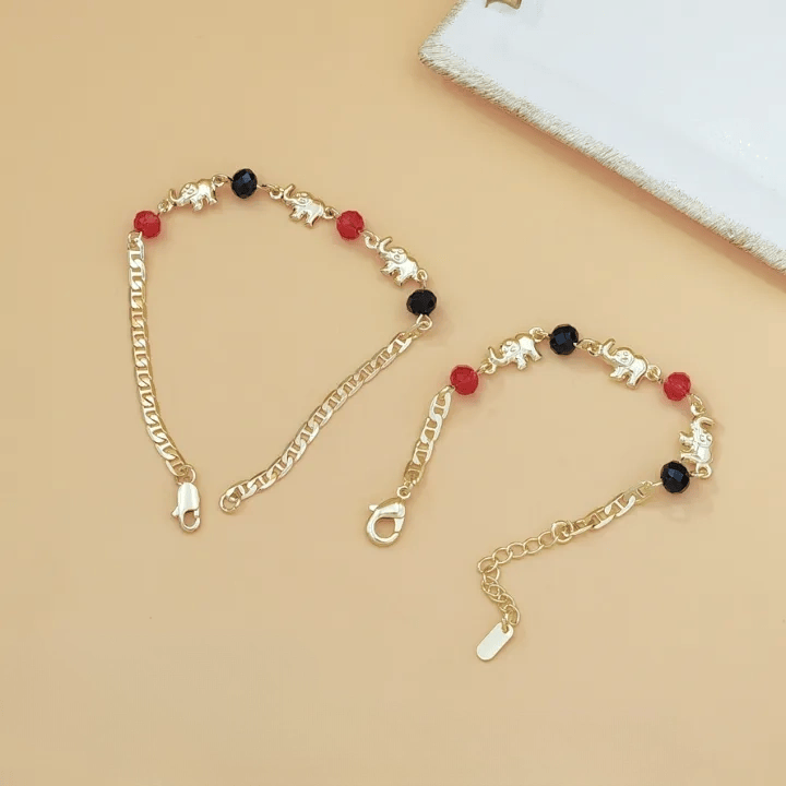 Bracelet Olivenorma en cuivre avec pendentif multi-éléphants et symbole de bénédiction - image 4