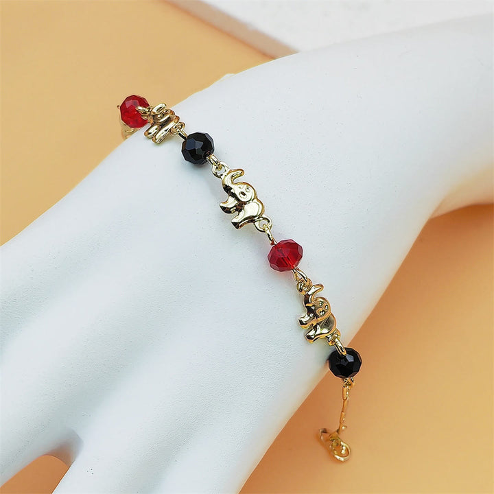 Bracelet Olivenorma en cuivre avec pendentif multi-éléphants et symbole de bénédiction - image 6