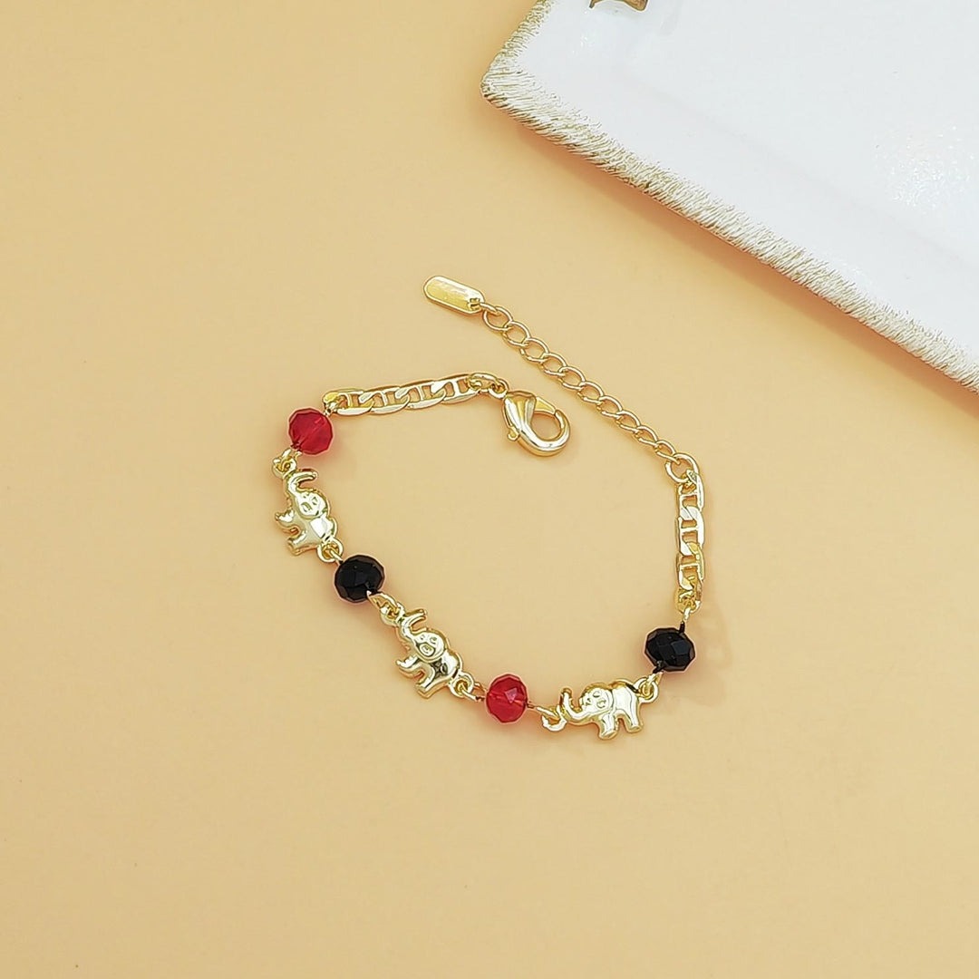 Bracelet Olivenorma en cuivre avec pendentif multi-éléphants et symbole de bénédiction - Enfants - image 2