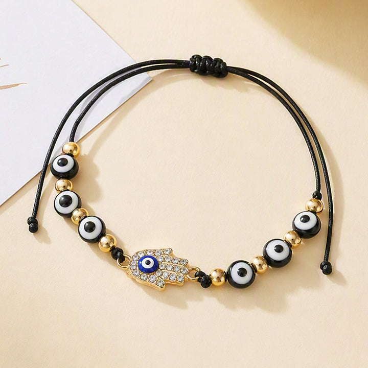 Bracelet Olivenorma en cuivre avec breloque œil protecteur et formes multiples - image 3