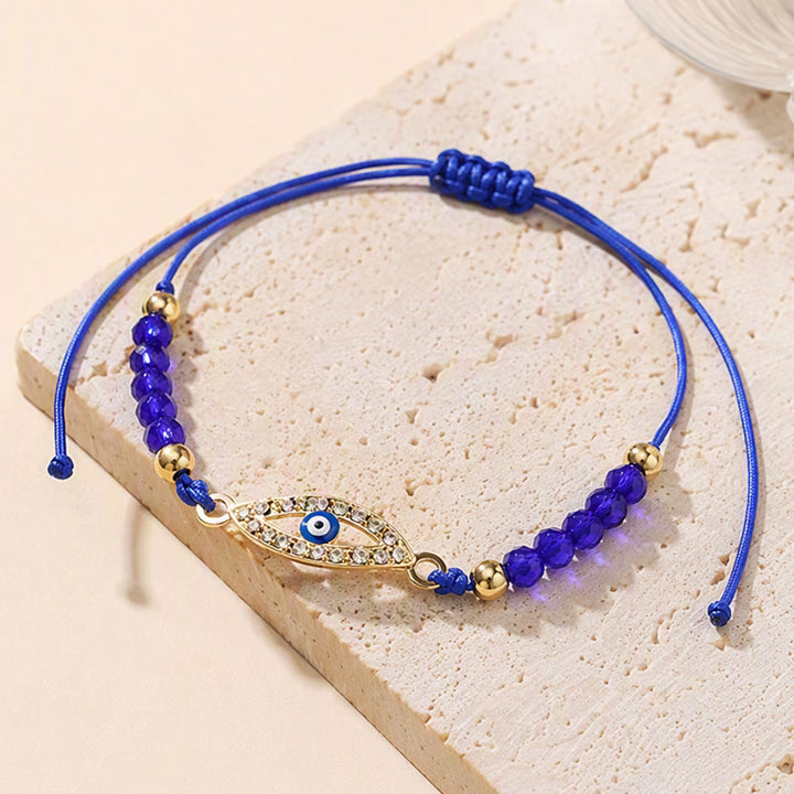 Bracelet Olivenorma en cuivre avec breloque œil protecteur et formes multiples - image 5
