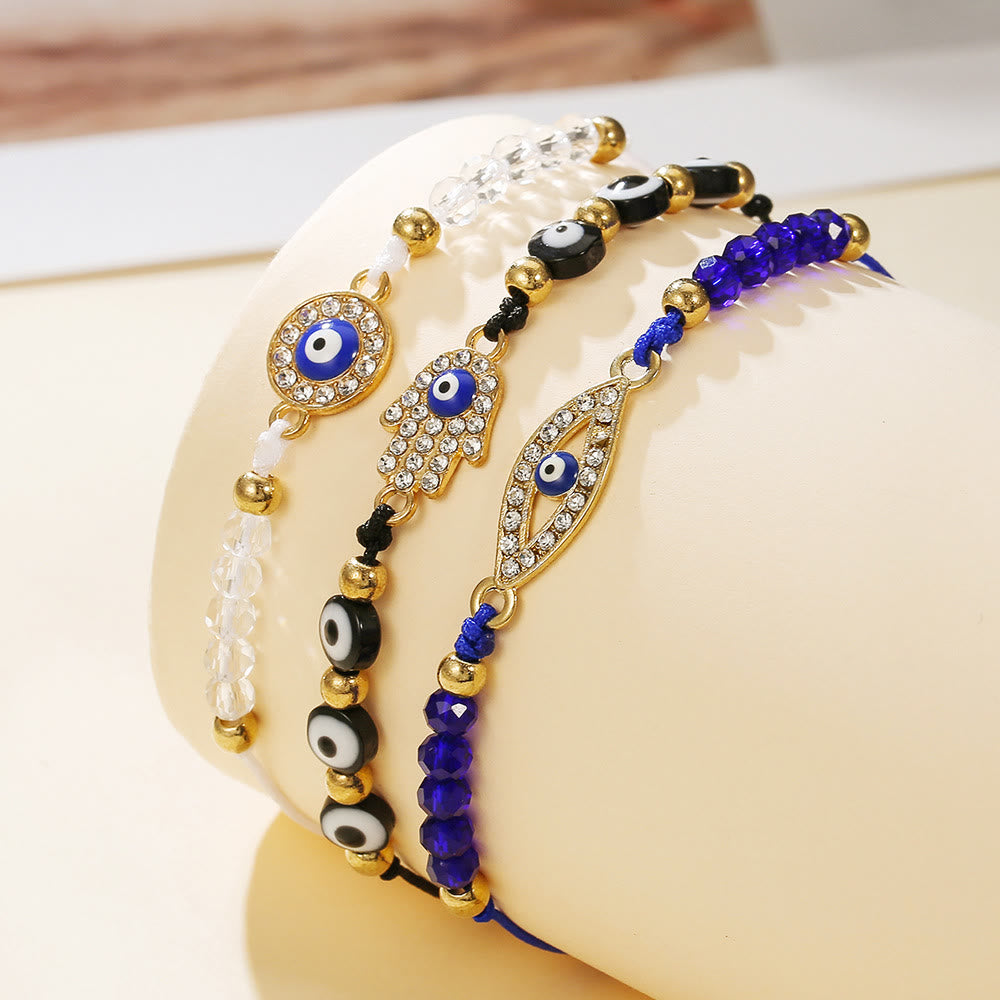 Bracelet Olivenorma en cuivre avec breloque œil protecteur et formes multiples - Noir, bleu et blanc - image 0