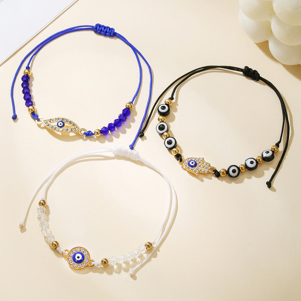 Bracelet Olivenorma en cuivre avec breloque œil protecteur et formes multiples - image 1