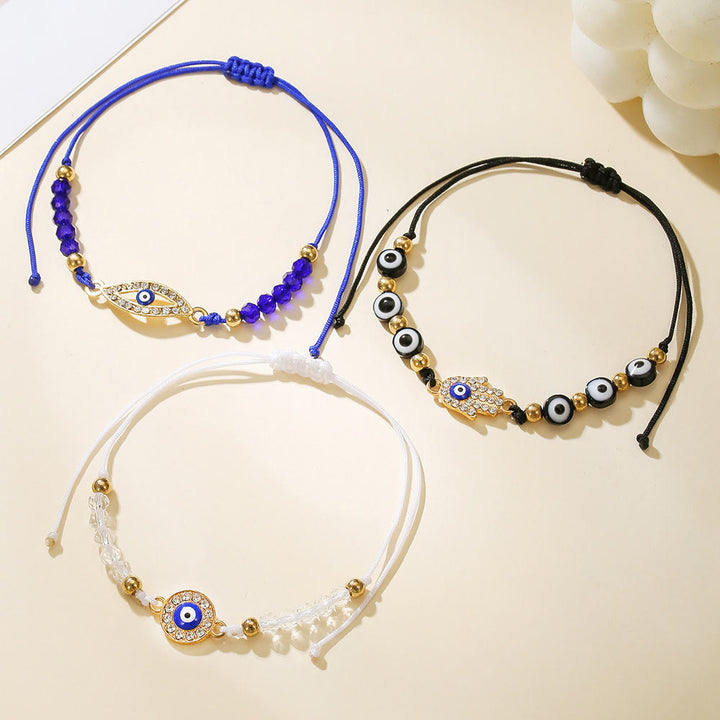 Bracelet Olivenorma en cuivre avec breloque œil protecteur et formes multiples - image 1