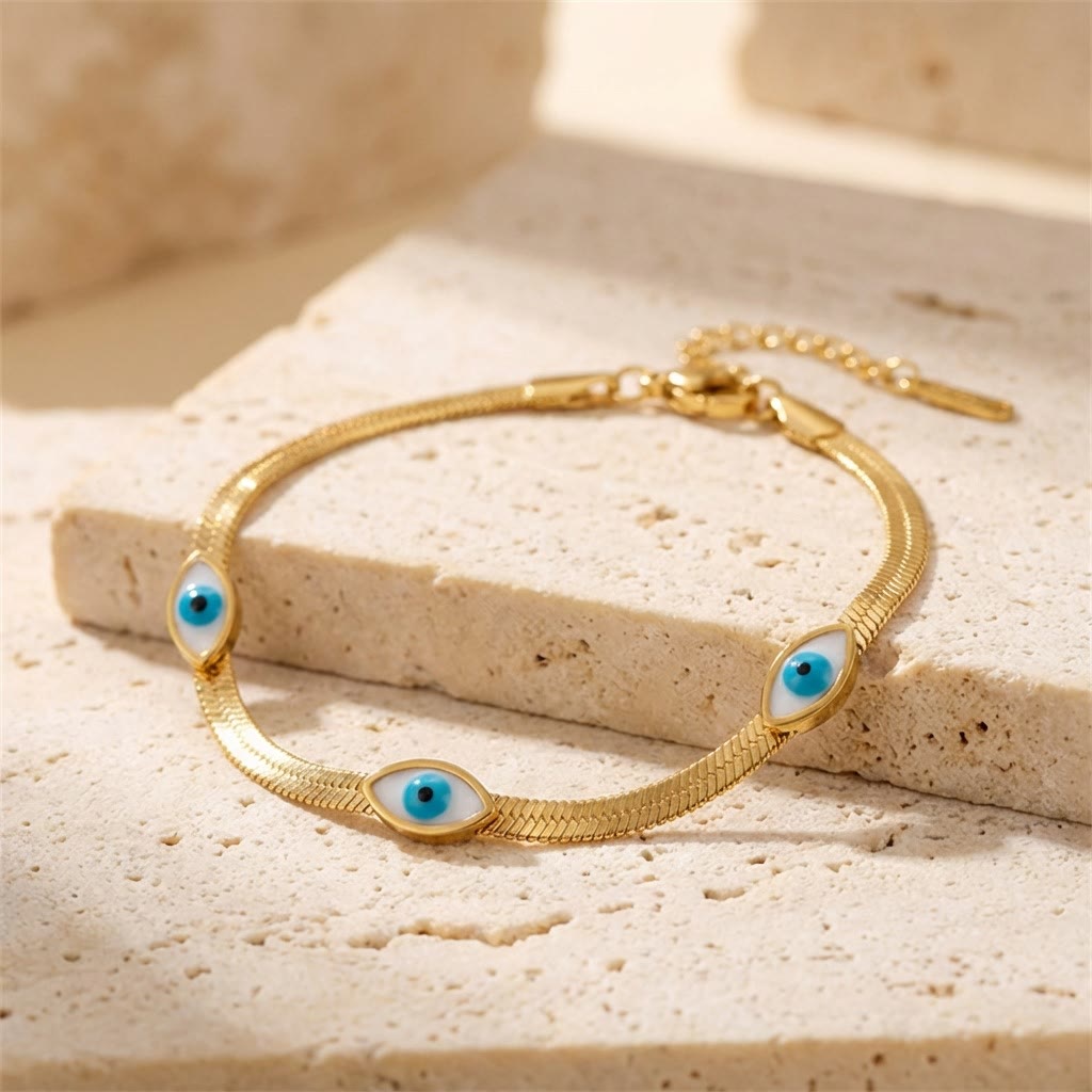 Bracelet Olivenorma en acier inoxydable avec triple œil protecteur et chaîne serpent. - Chaîne serpent à triple émail avec œil maléfique - image 0