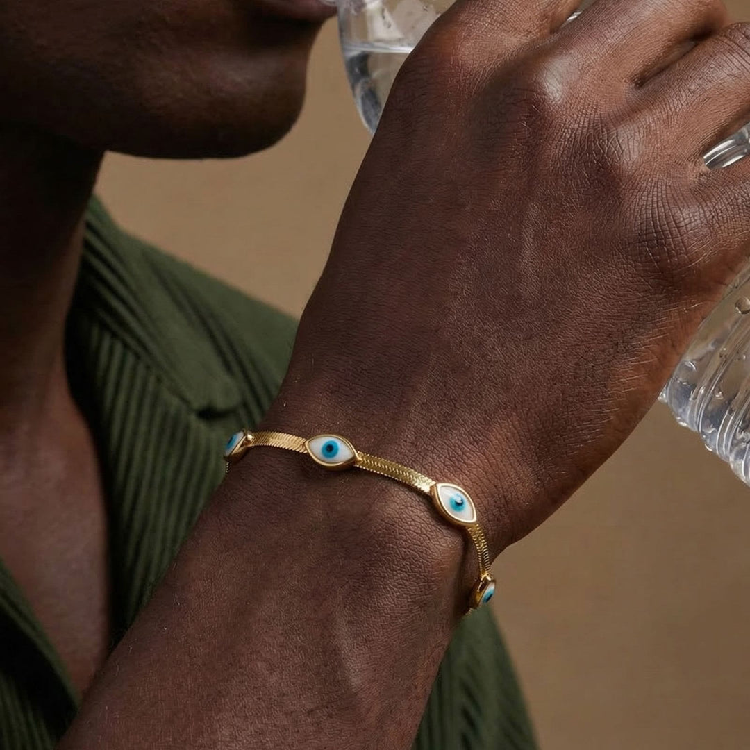 Bracelet Olivenorma en acier inoxydable avec triple œil protecteur et chaîne serpent. - image 6