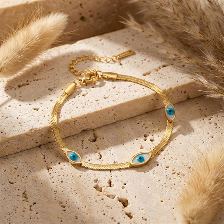 Bracelet Olivenorma en acier inoxydable avec triple œil protecteur et chaîne serpent. - image 1
