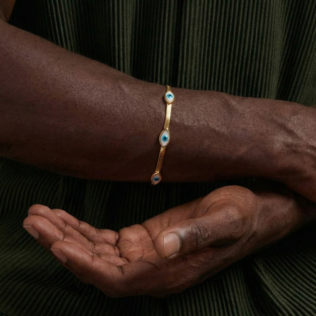Bracelet Olivenorma en acier inoxydable avec triple œil protecteur et chaîne serpent. - image 9