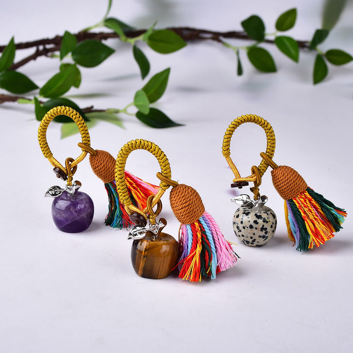 Porte-clés Olivenorma en cristal, motif pomme et pompon, symbole de bénédiction - image 0