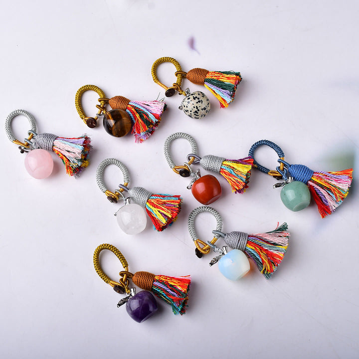 Porte-clés Olivenorma en cristal, motif pomme et pompon, symbole de bénédiction - image 2