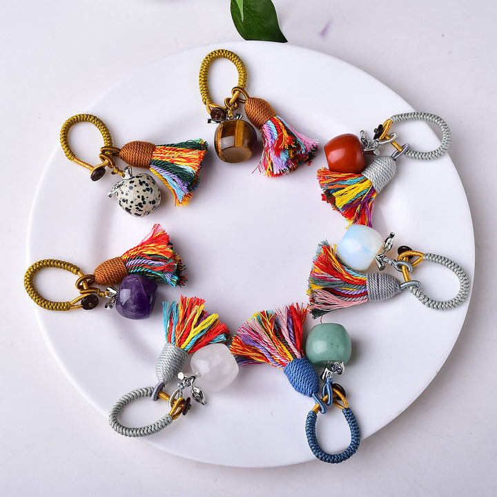 Porte-clés Olivenorma en cristal, motif pomme et pompon, symbole de bénédiction - image 1