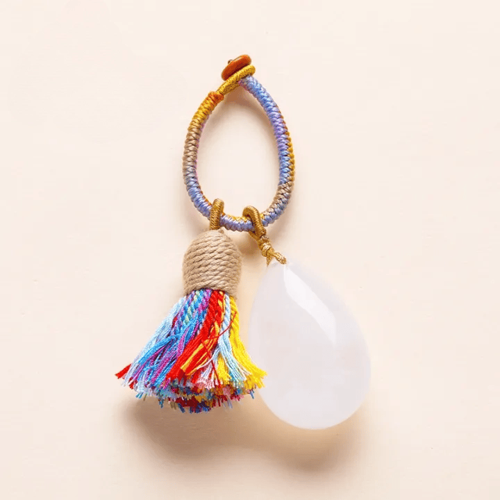 Porte-clés Olivenorma en cristal naturel, pompon en forme de larme, tissé à la main, symbole de protection et de bénédiction. - Quartz clair - image 6