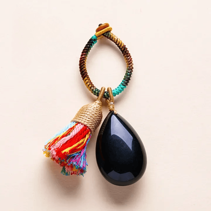 Porte-clés Olivenorma en cristal naturel, pompon en forme de larme, tissé à la main, symbole de protection et de bénédiction. - Obsidienne - image 10