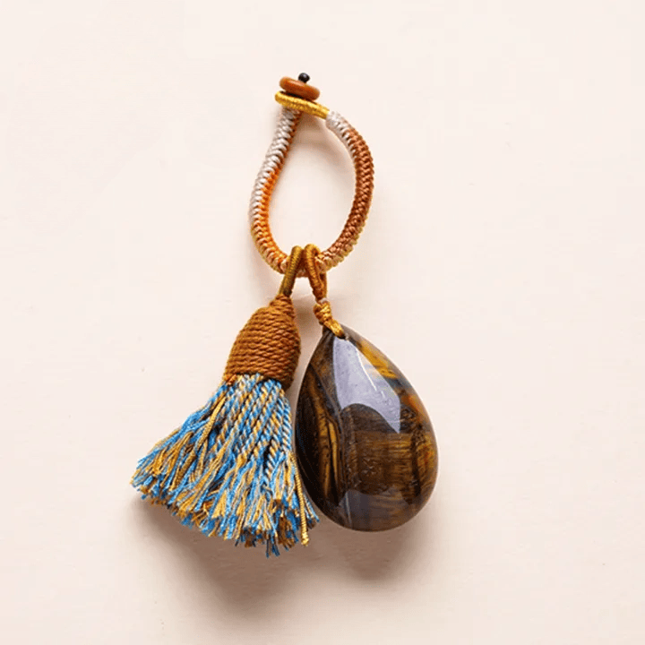 Porte-clés Olivenorma en cristal naturel, pompon en forme de larme, tissé à la main, symbole de protection et de bénédiction. - Œil de tigre - image 12