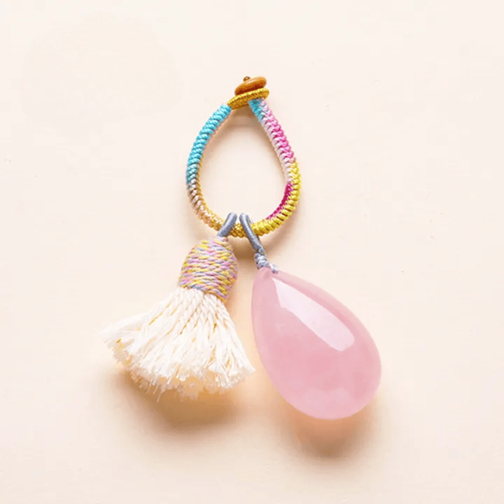 Porte-clés Olivenorma en cristal naturel, pompon en forme de larme, tissé à la main, symbole de protection et de bénédiction. - Quartz rose - image 2