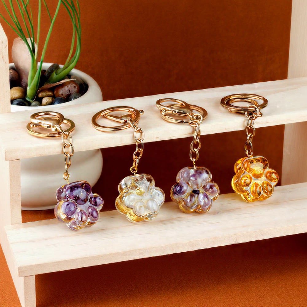 Porte-clés porte-bonheur Olivenorma en résine cristal naturelle et forme de patte de chat, chaîne dorée - image 0