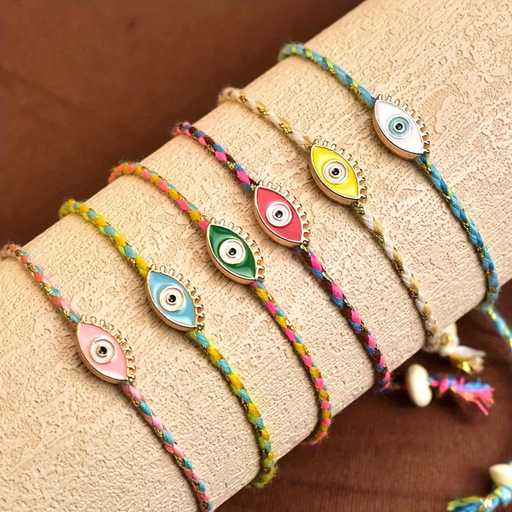 Bracelet Olivenorma en alliage coloré avec pompon et symbole de bénédiction en forme d'œil protecteur - image 0