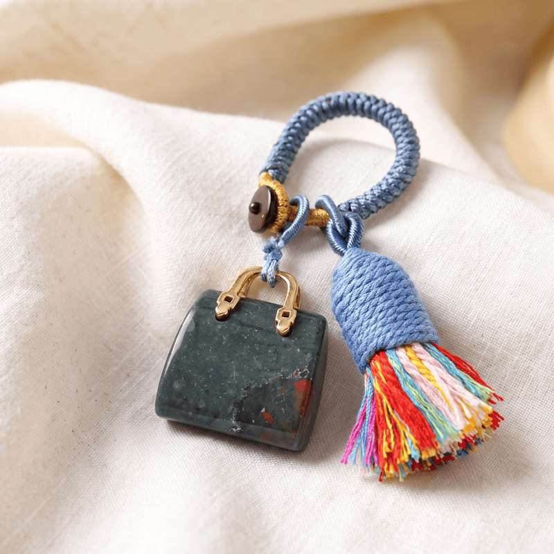 Porte-clés Olivenorma en cristal naturel, en forme de sac à main, avec pompon tressé et symbole de prospérité - Héliotrope africain - image 15