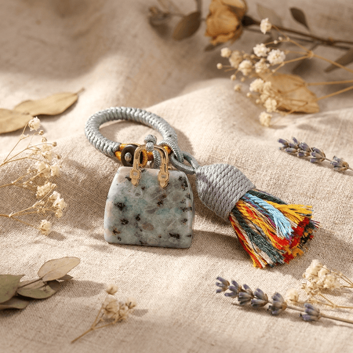 Porte-clés Olivenorma en cristal naturel, en forme de sac à main, avec pompon tressé et symbole de prospérité - Pierre de kiwi - image 22