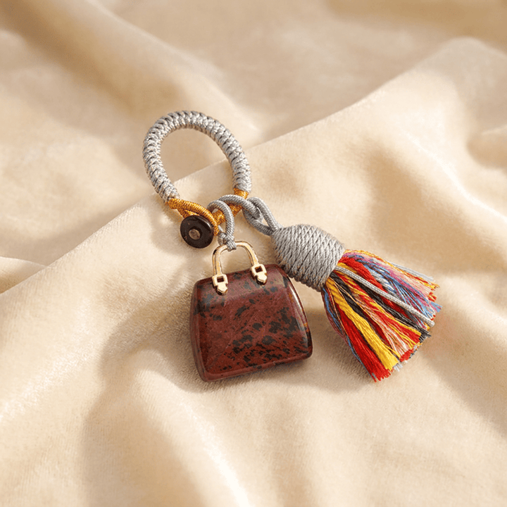Porte-clés Olivenorma en cristal naturel, en forme de sac à main, avec pompon tressé et symbole de prospérité - Acajou - image 33