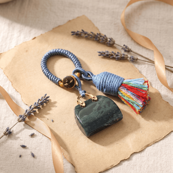 Porte-clés Olivenorma en cristal naturel, en forme de sac à main, avec pompon tressé et symbole de prospérité - Agate d'Inde - image 25