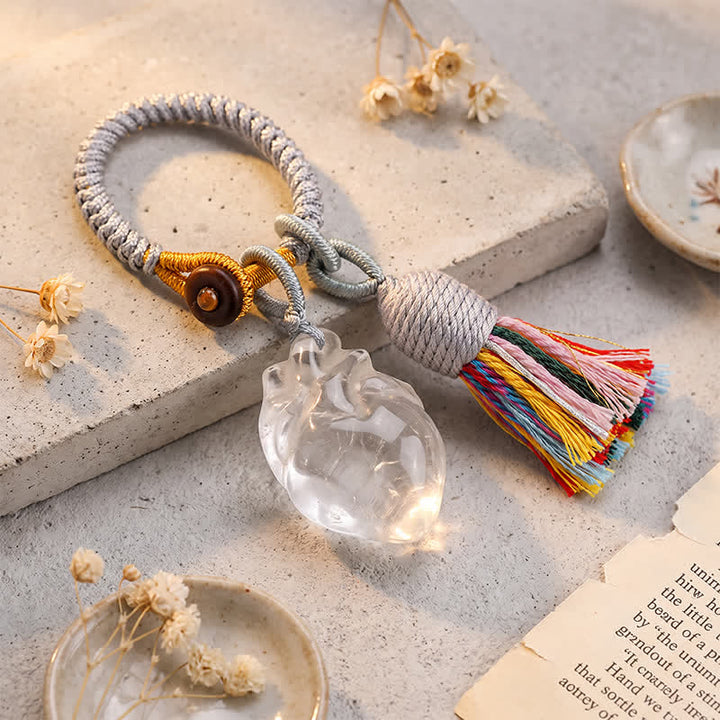Porte-clés Olivenorma en cristal naturel, forme de cœur anatomique, pompon tissé à la main, symbole d'affection et de bénédiction - Quartz clair - image 1