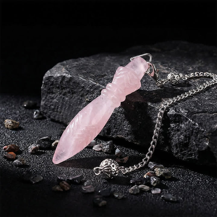 Pendule Olivenorma en cristal sculpté, motif pointe de lance, symbole spirituel - Quartz rose - image 18