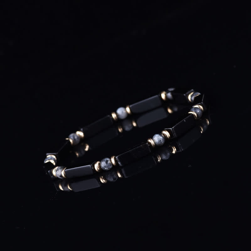 Bracelet Olivenorma en pierres naturelles avec perles et symbole de protection - image 2