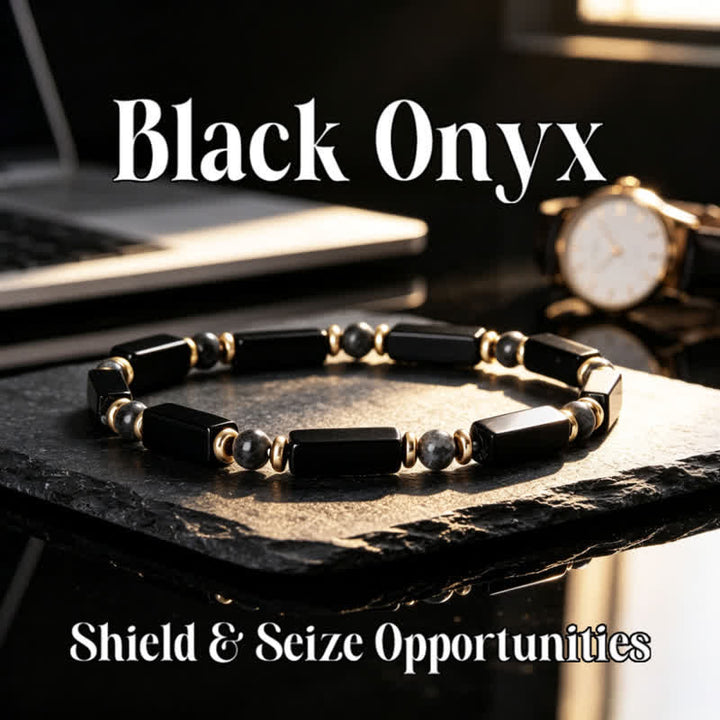 Bracelet Olivenorma en pierres naturelles avec perles et symbole de protection - Onyx noir et obsidienne - image 0