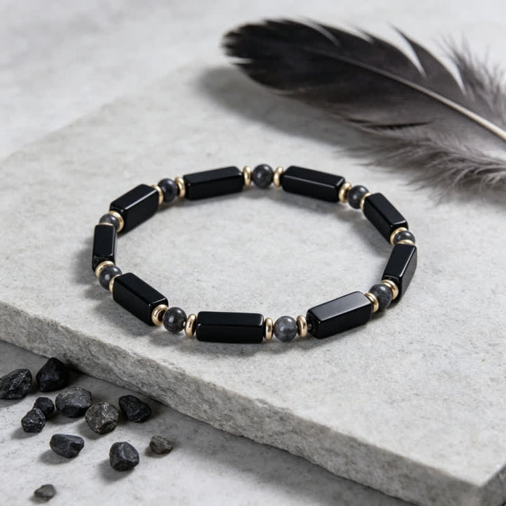 Bracelet Olivenorma en pierres naturelles avec perles et symbole de protection - image 1