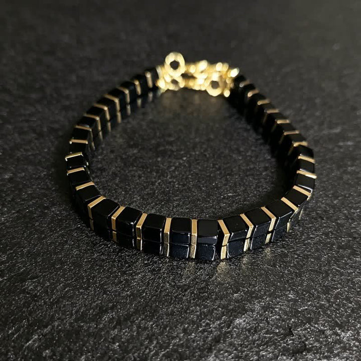 Bracelet Olivenorma en pierres naturelles avec perles et symbole de protection - Obsidienne - image 16