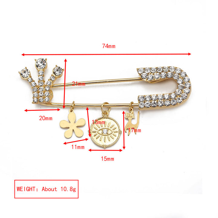 Broche en forme de cœur avec mauvais œil en zircon blanc Olivenorma 