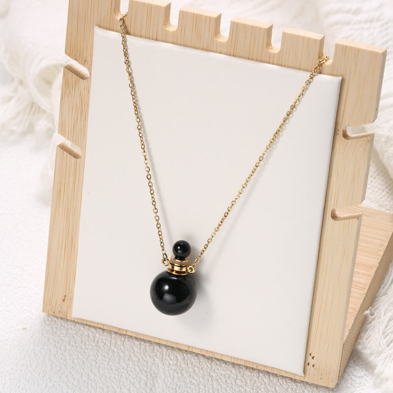 Collier pendentif bouteille de parfum en pierre ronde Olivenorma