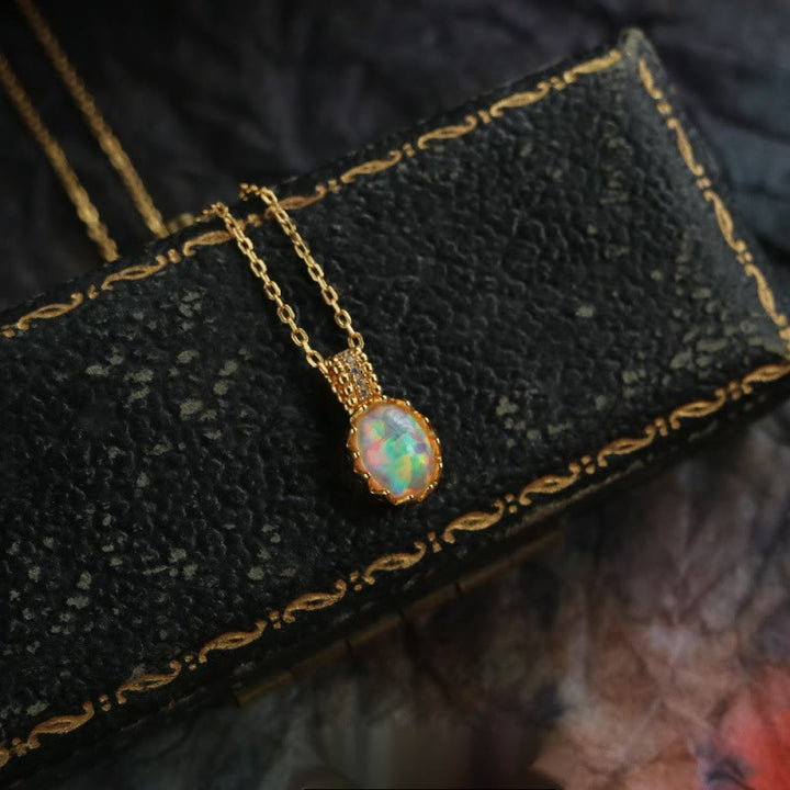 Collier avec anneau en or jaune opale Olivenorma 