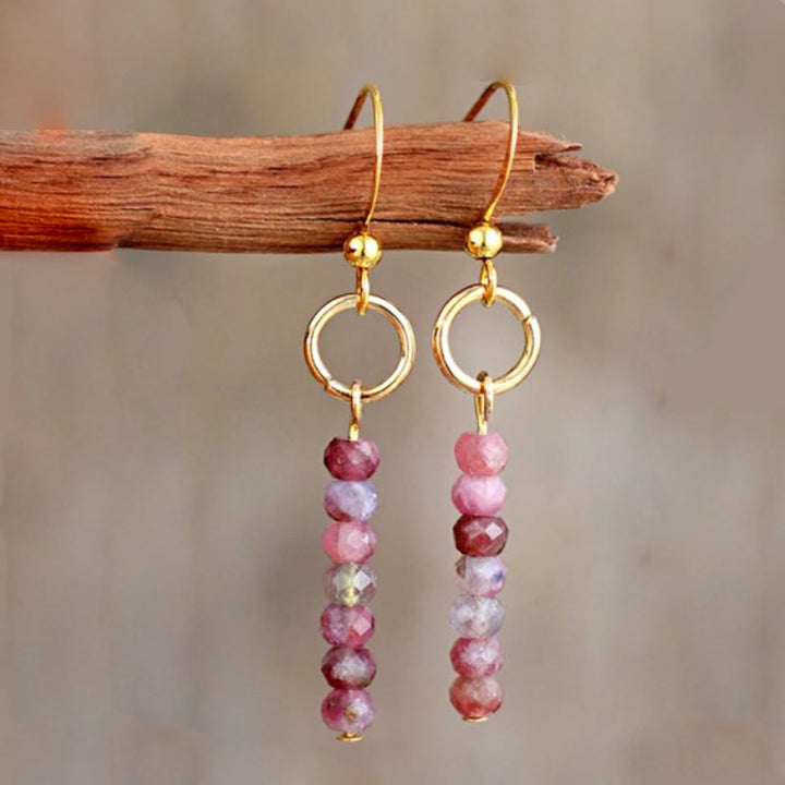 Boucles d'oreilles en perles de roue en quartz fraise, bronzite et agalmatolite Olivenorma
