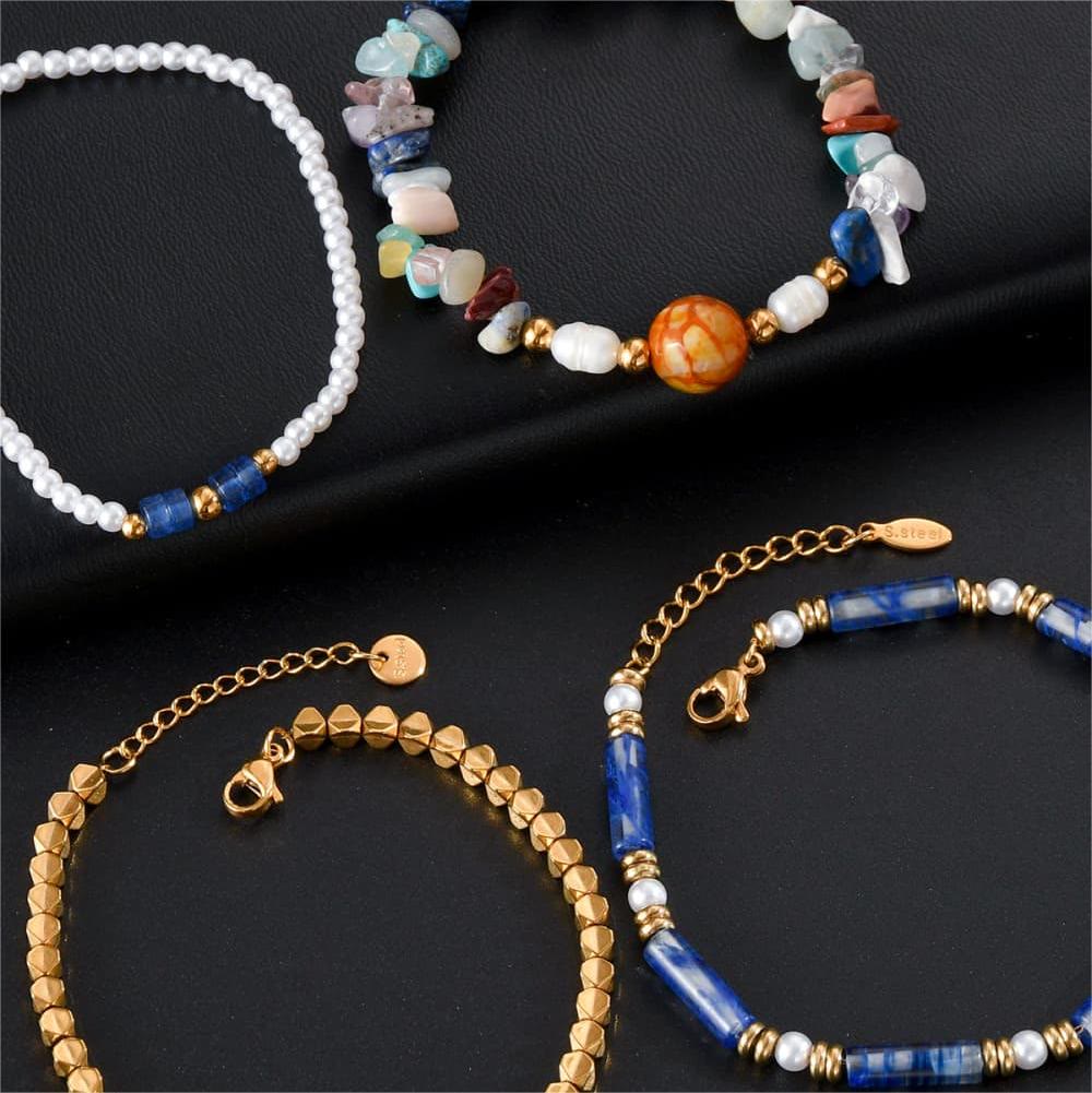 Ensemble de quatre bracelets en perles de cristal naturel Olivenorma
