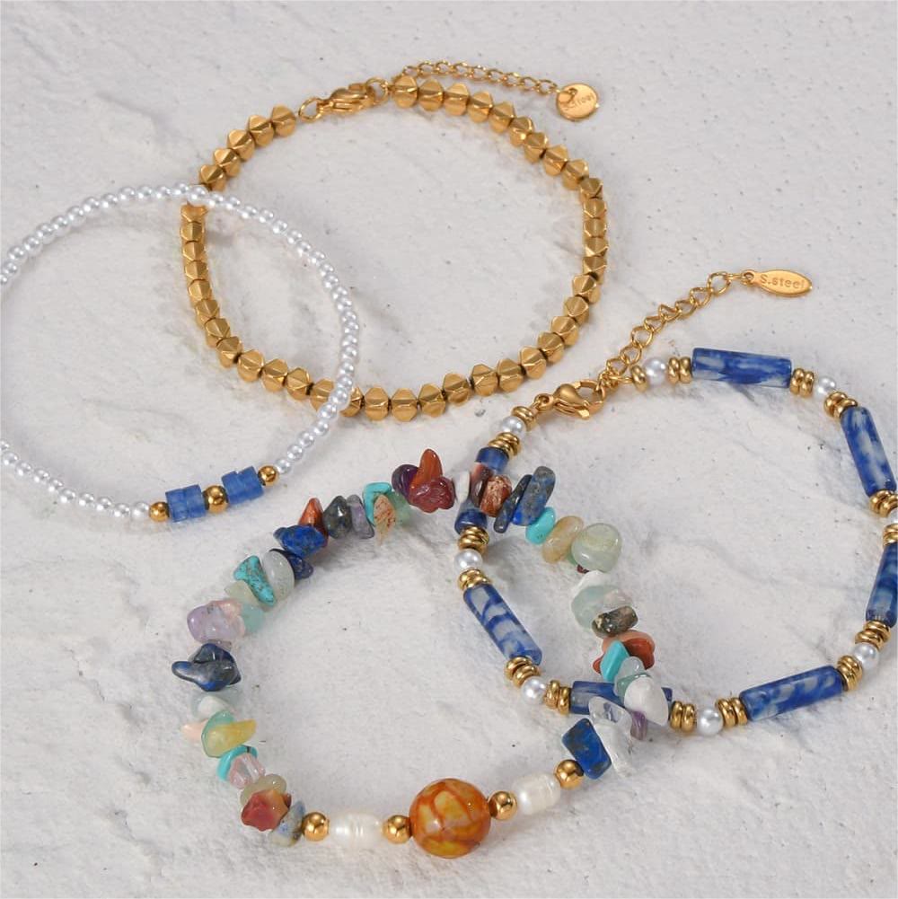 Ensemble de quatre bracelets en perles de cristal naturel Olivenorma